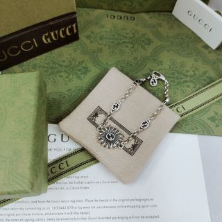 Gucci GG Floral Cross Charm Silver Chain Bracelet