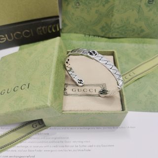 Gucci Engraved GG Twist Cuff Bracelet