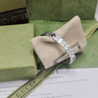 Gucci Engraved GG Twist Cuff Bracelet