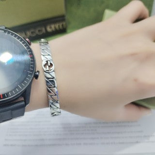 Gucci Engraved GG Twist Cuff Bracelet