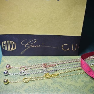 Gucci Layered Interlocking G Pendant Chain Necklace