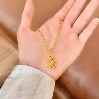 CHANEL Golden Bow CC Charm Necklace