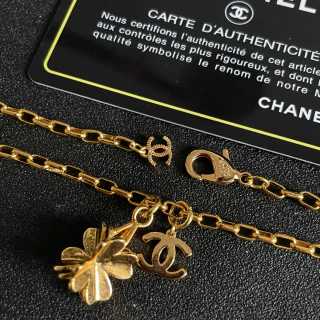 CHANEL Golden Bow CC Charm Necklace