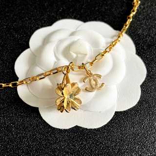 CHANEL Golden Bow CC Charm Necklace