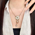 CHANEL Silver Bloom Pendant Necklace