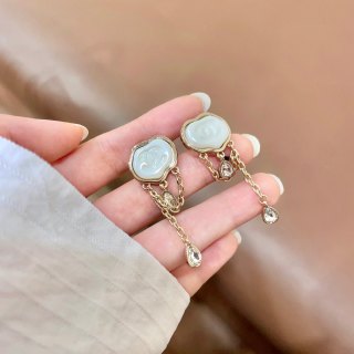 CHANEL Ivory Charm Tassel Earrings