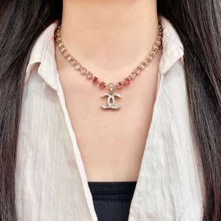 CHANEL Rosé Crystal Charm Necklace
