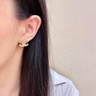 CHANEL Golden Interlock CC Stud Earrings