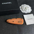 Chanel Orange Acrylic CC Hair Clip – Elegant Luxury Fashion Accessory