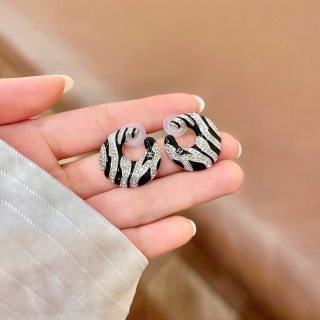 Chanel Modern Sculptural Curve Stud Earrings