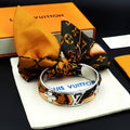 Louis Vuitton Monogram Silk Charm Cuff Bracelet