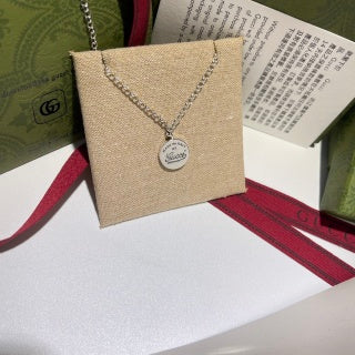 Gucci Round Logo Engraved Medallion Necklace