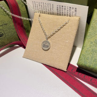 Gucci Round Logo Engraved Medallion Necklace