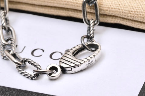 Gucci GG Engraved Oval Medallion Silver Pendant Necklace