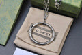 Gucci GG Engraved Oval Medallion Silver Pendant Necklace