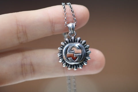 Gucci GG Sunburst Medallion Silver Necklace