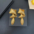 YSL Textured Gold Sculptural Drop Clip-On Earrings