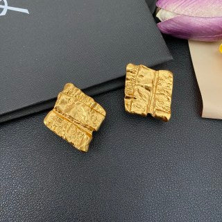 YSL Textured Gold Relief Clip-On Earrings