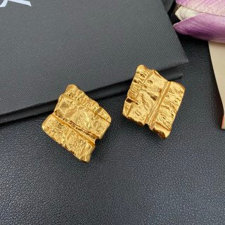 YSL Textured Gold Relief Clip-On Earrings