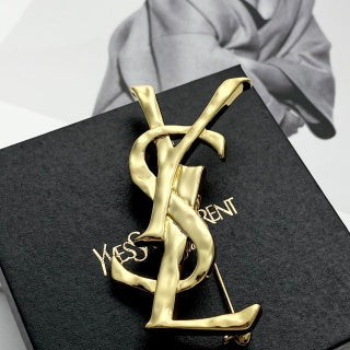YSL Sculpted Gold Monogram Pin Brooch