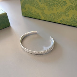 Gucci GG Pattern Engraved Silver Cuff Bracelet