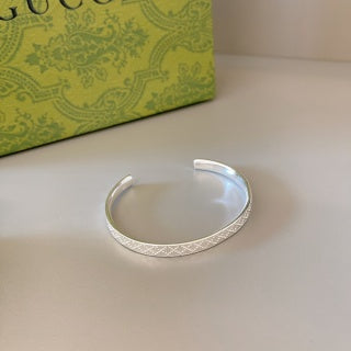 Gucci GG Pattern Engraved Silver Cuff Bracelet