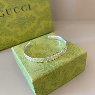 Gucci GG Pattern Engraved Silver Cuff Bracelet