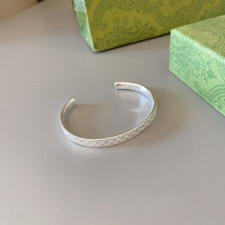 Gucci GG Pattern Engraved Silver Cuff Bracelet
