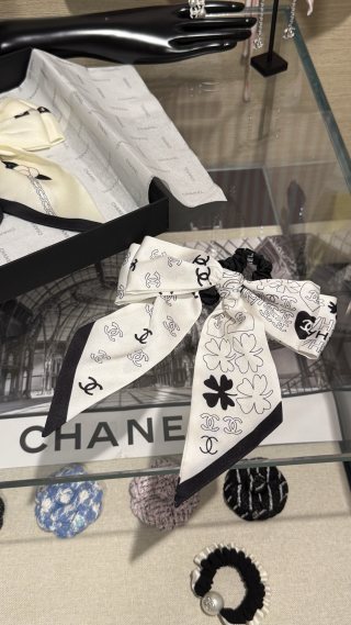 Chanel Double-Sided Bow Hair Tie with Heart and Four-Leaf Clover Motifs