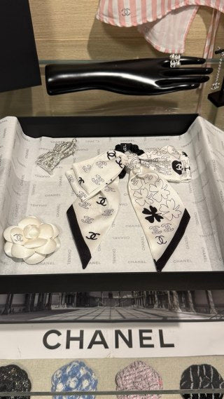 Chanel Double-Sided Bow Hair Tie with Heart and Four-Leaf Clover Motifs