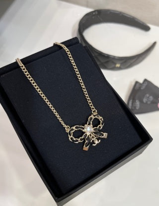 Chanel Crystal Bow Pendant Necklace – Elegant Luxury Fashion Jewelry