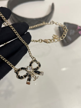 Chanel Crystal Bow Pendant Necklace – Elegant Luxury Fashion Jewelry