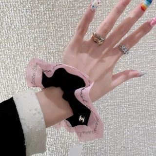 Chanel Black Lace Bow Scrunchie – Elegant Luxury Hair Accessory