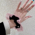 Chanel Black Lace Bow Scrunchie – Elegant Luxury Hair Accessory