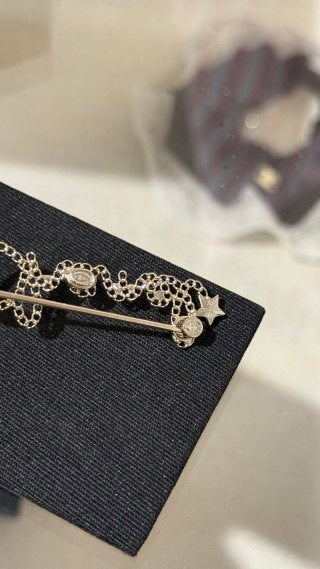 Chanel Openwork Chain Script Letter & Star Brooch with Full Pavé Diamonds
