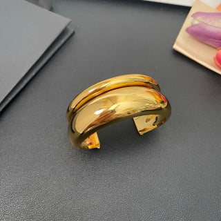 YSL Fluid Gold Sculptural Cuff Bracelet