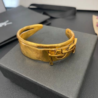 YSL Wide Monogram Engraved Gold Cuff Bracelet