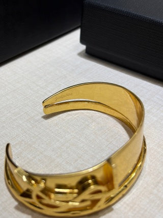 YSL Wide Gold Monogram Panel Cuff Bracelet