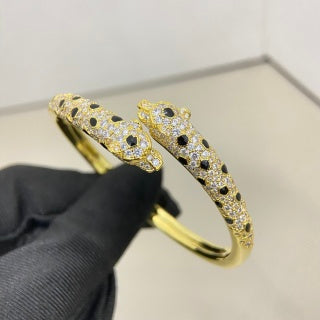 Cartier narrow-width, pavé-diamond double-headed panther bracelet