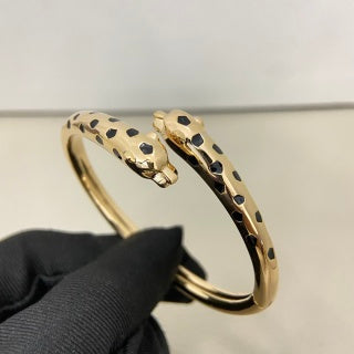 Cartier slim, narrow, polished double-headed panther bracelet