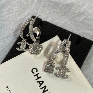 CHANEL Eveloria Silver Charm Cascade Drop Earrings