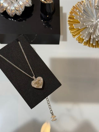 Chanel Crystal Heart CC Pendant Necklace – Elegant Luxury Jewelry