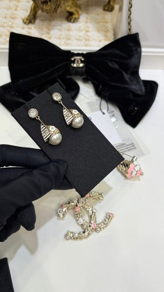 CHANEL Pearl Ribbon Drop Stud Earrings
