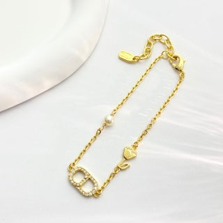 Dior CD Pearl Heart Charm Gold Bracelet