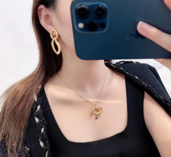 YSL Sculptural Loop Gold Clip-On Earrings