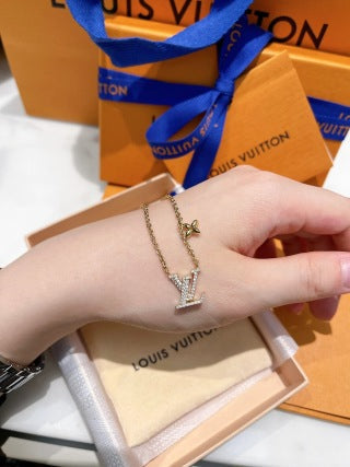 Louis Vuitton Crystal LV Initial Flower Pendant Necklace