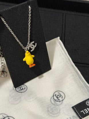 Chanel Yellow Duck Charm Necklace – Playful Luxury Fashion Jewelry