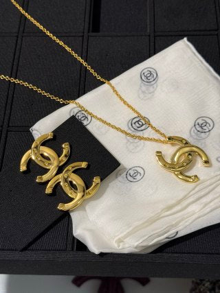 Chanel Gold-Tone Long Necklace with Smooth Finish and Openwork Double-C Logo