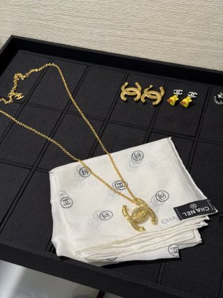 Chanel Gold-Tone Long Necklace with Smooth Finish and Openwork Double-C Logo