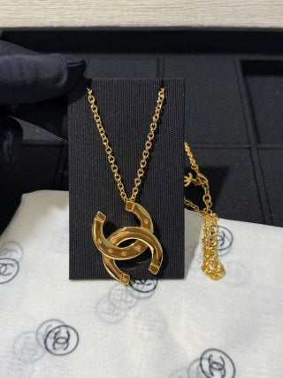 Chanel Gold-Tone Long Necklace with Smooth Finish and Openwork Double-C Logo